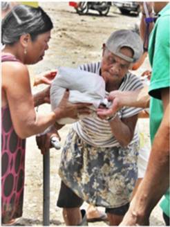  _504_https://www.helpage.org/silo/images/an-older-woman-receives-a-relief-package_246x328.jpg