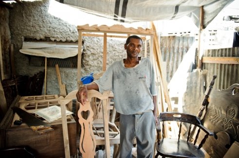  _926_https://www.helpage.org/silo/images/gilbert-66-haiti-with-chair_491x326.jpg
