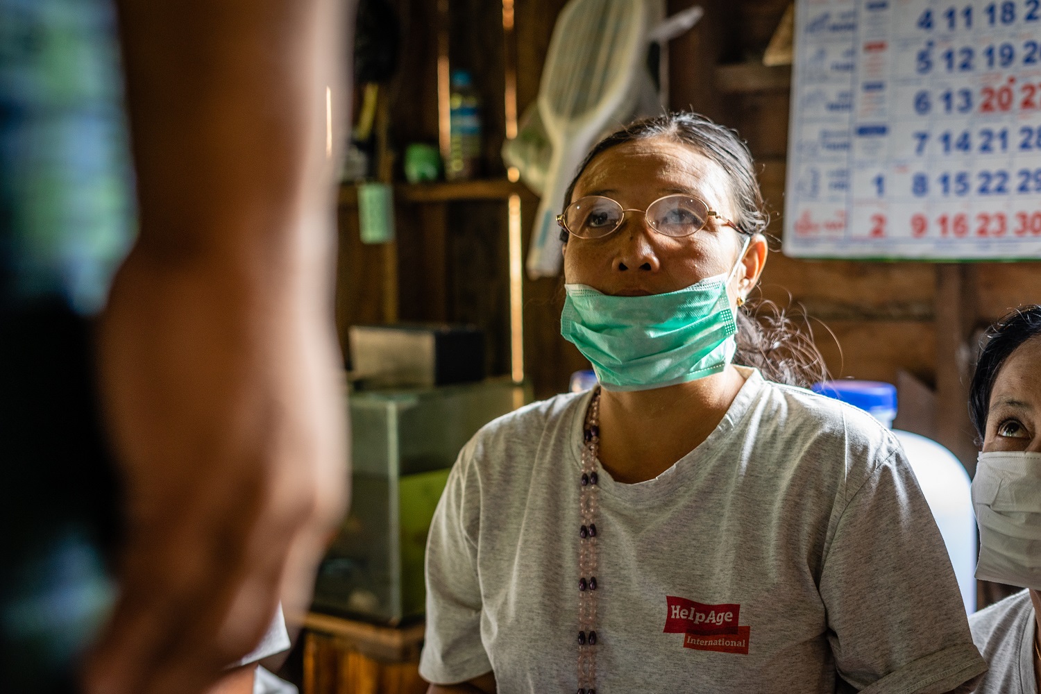  _335_https://www.helpage.org/silo/images/older-woman-checks-mans-health-in-myanmarfullsize_1500x1000.jpg