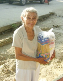  _58_https://www.helpage.org/silo/images/rosalba-with-food-basket-colombia-floods_213x273.jpg