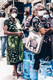  _273_https://www.helpage.org/silo/images/sri-lanka-crisisolder-people-queuing_213x319.jpg