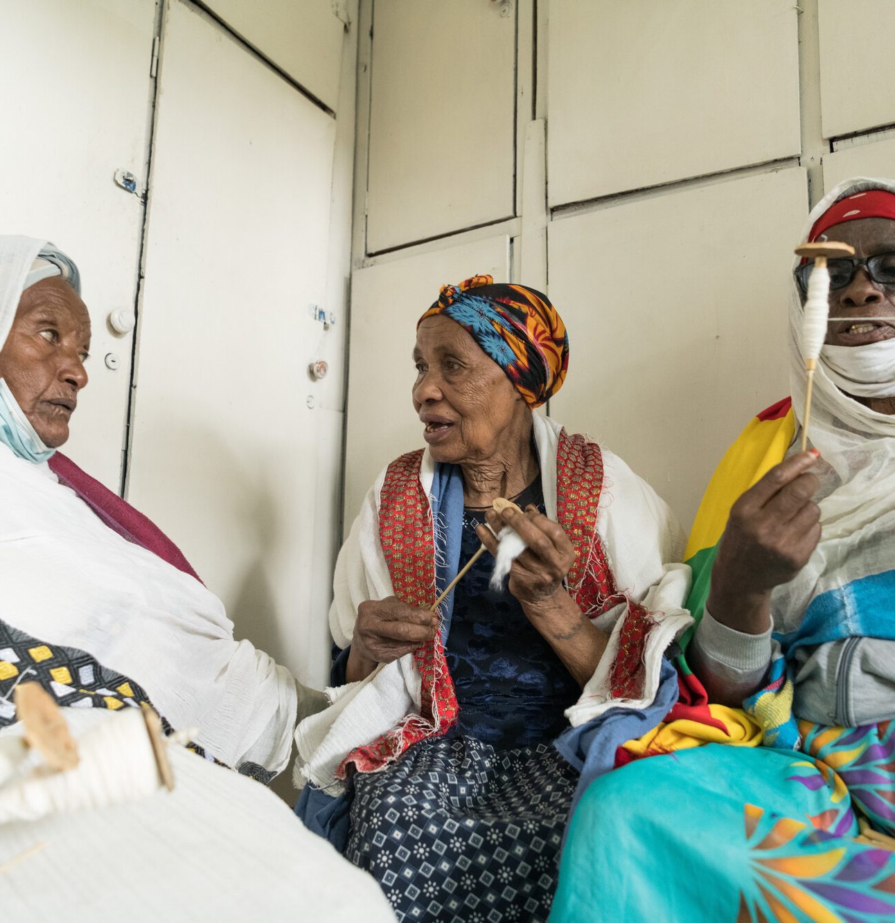 Here, from left to right Kelemuwa Tekle,76, Aselefech Zeleke and Yimenashu Eondemiyihun,68, all members of Eneredada Elder People Association are seen spinning cotton at the association's office in Addis Ababa, Ethiopia.