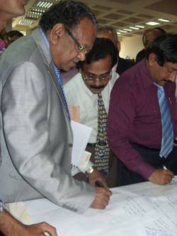 Dr Ruhul Haque, Minister of Health in Bangladesh, signs the ADA petition _237_https://www.helpage.org/silo/images/blogs/_1335458440.jpg