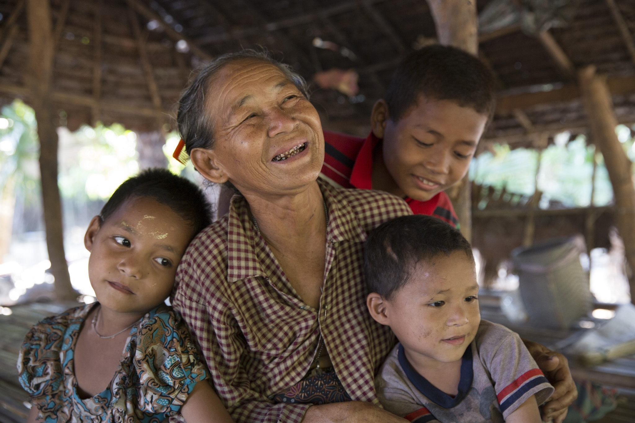  _161_https://www.helpage.org/silo/images/myanmar-daw-mu-nge-63-with-grandchildren_2048x1365.jpg